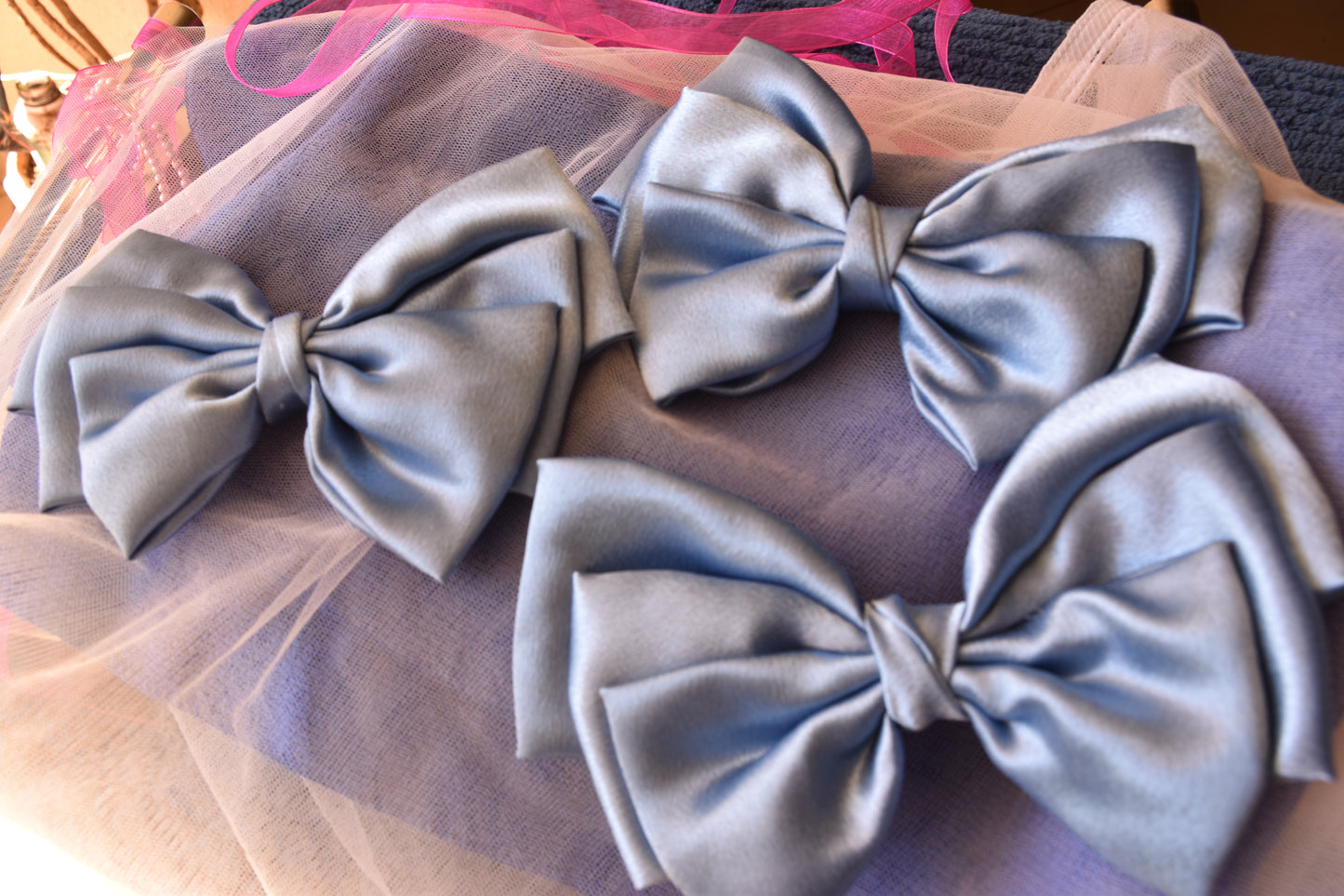 Three Ocean Drop Hair Bows - Front view of a set of large metallic ice blue satin hair bow clips, ideal for casual, formal, or everyday styling.