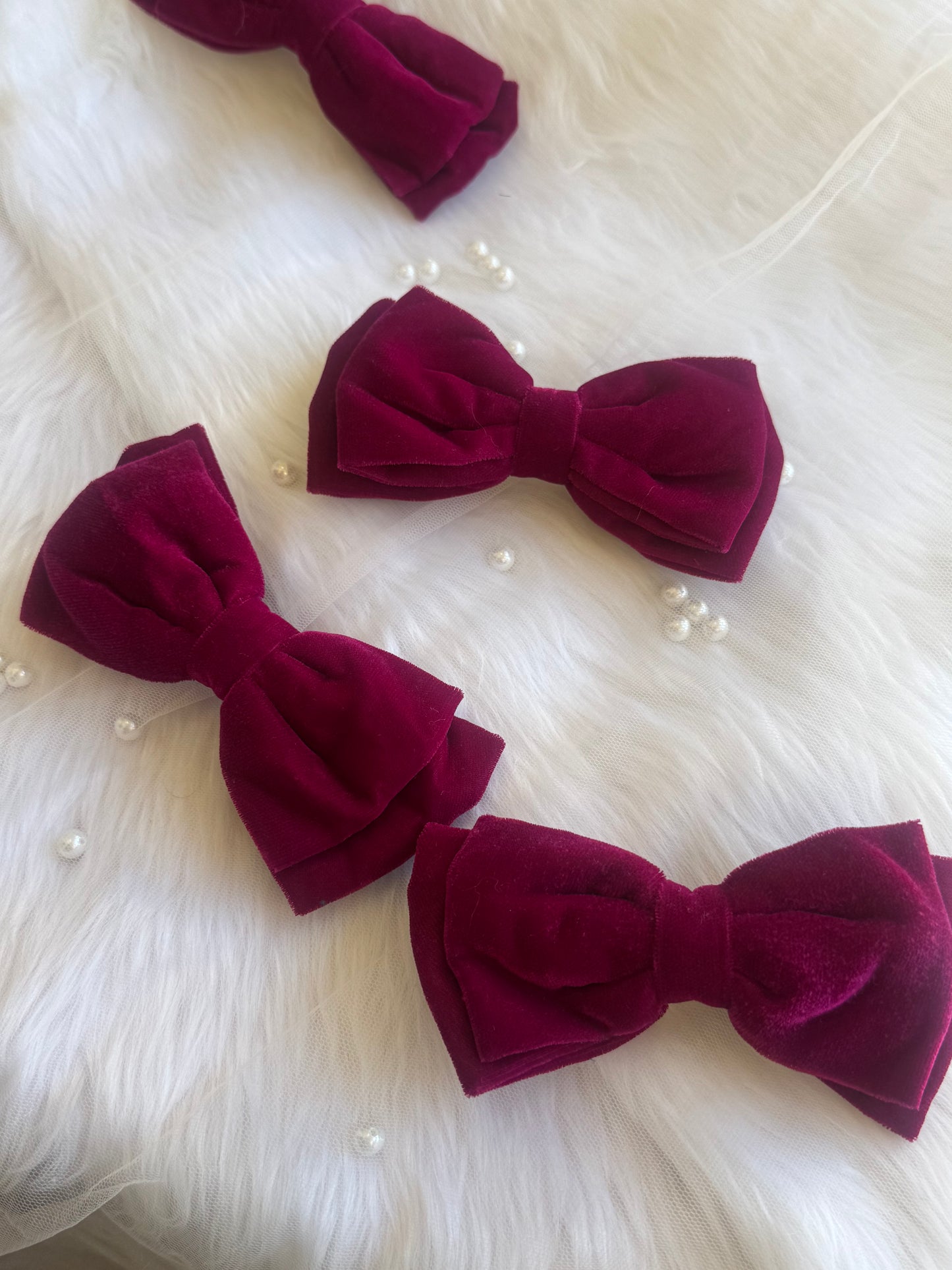 Multiple Runaway Diva Hair Bows - Front view of a collection of magenta pink premium velvet hair bow clips, perfect for casual, formal, or statement styling.