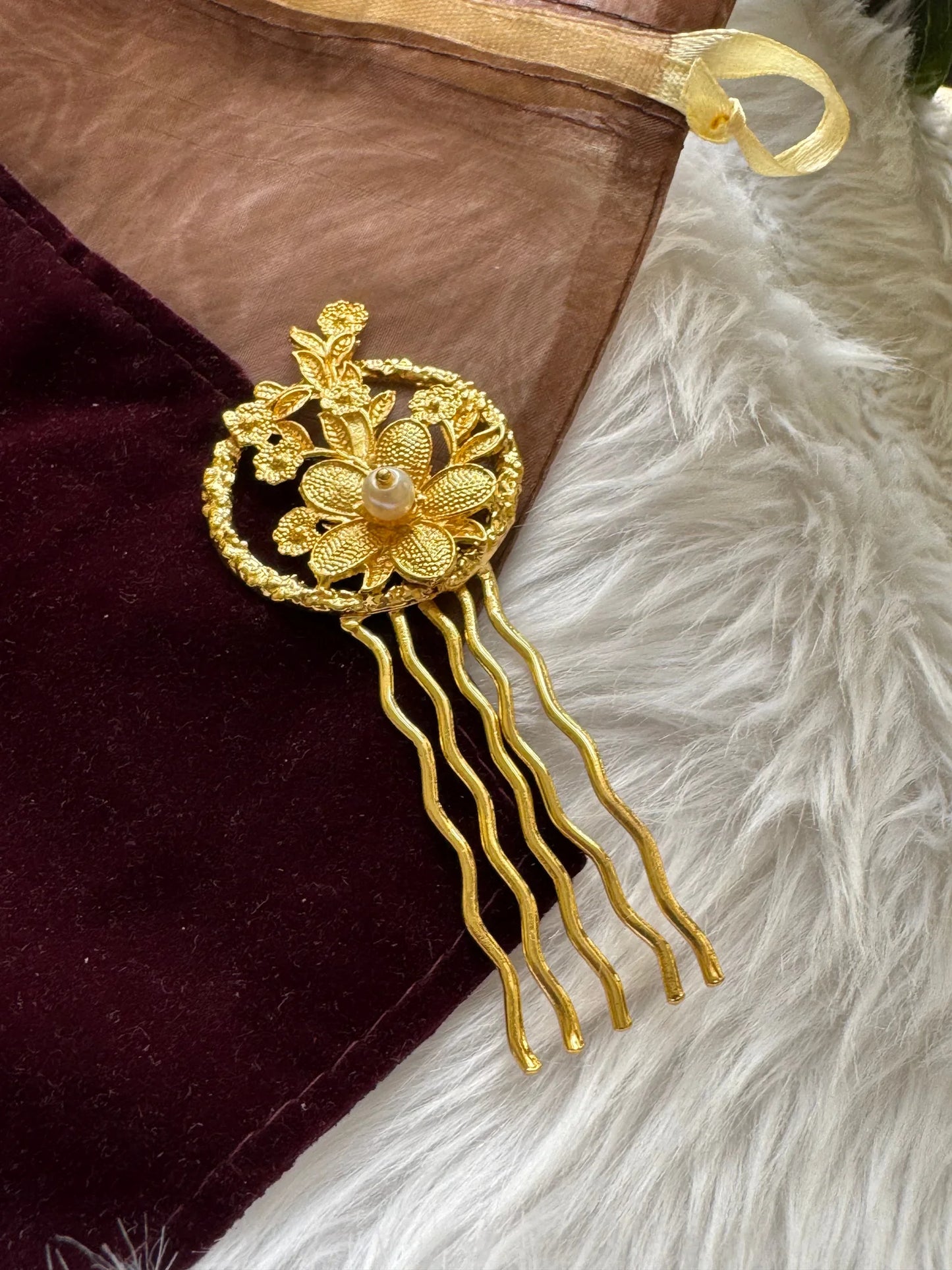 Golden Flora hair pin with ornate gold floral design and pearl detail on burgundy velvet, Bows and Bags India handmade