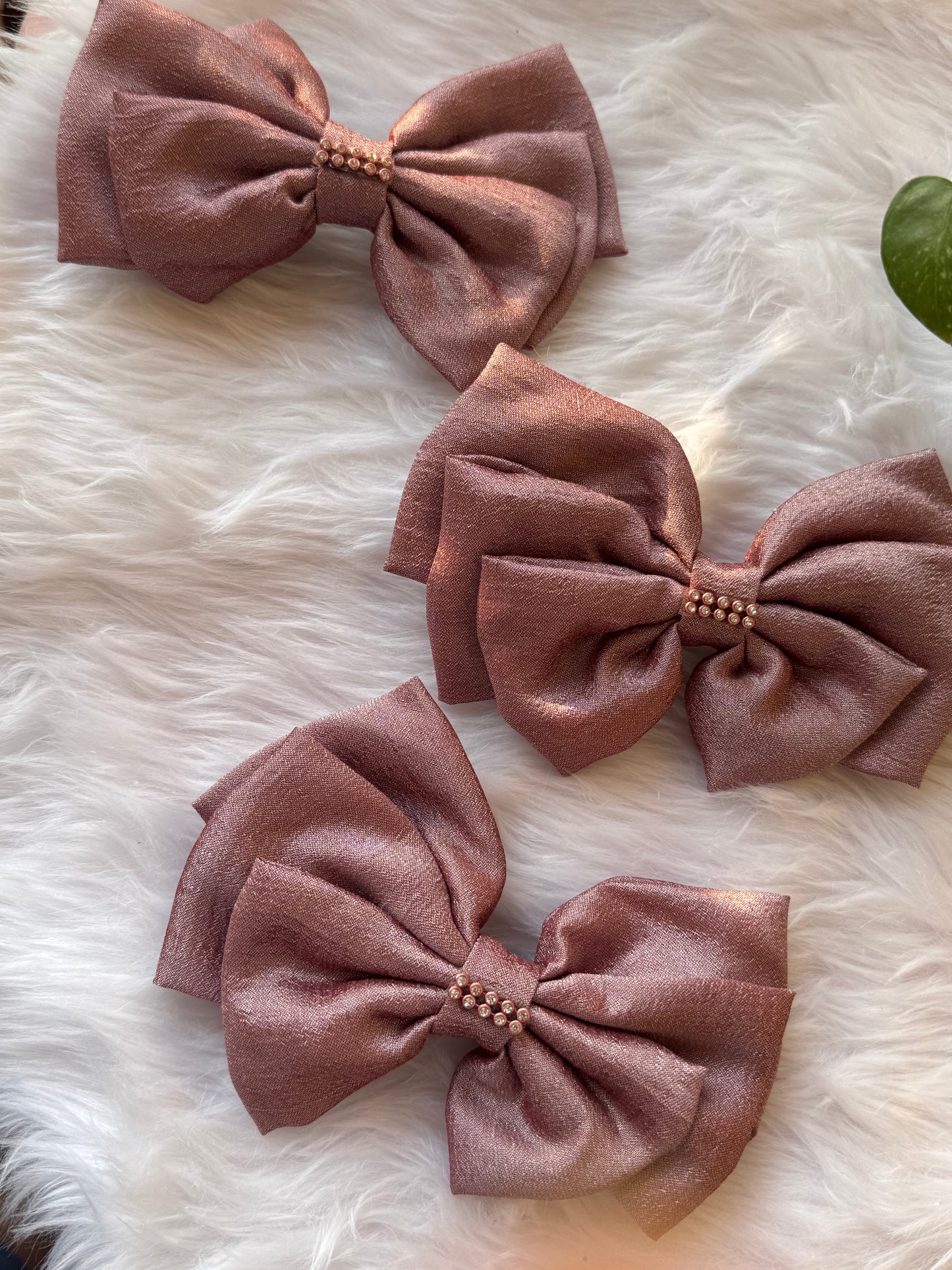 Collection of Rose Gold Satin Hair Bows – stylish Vichitra silk hair accessories with stone detailing, neatly arranged front-facing