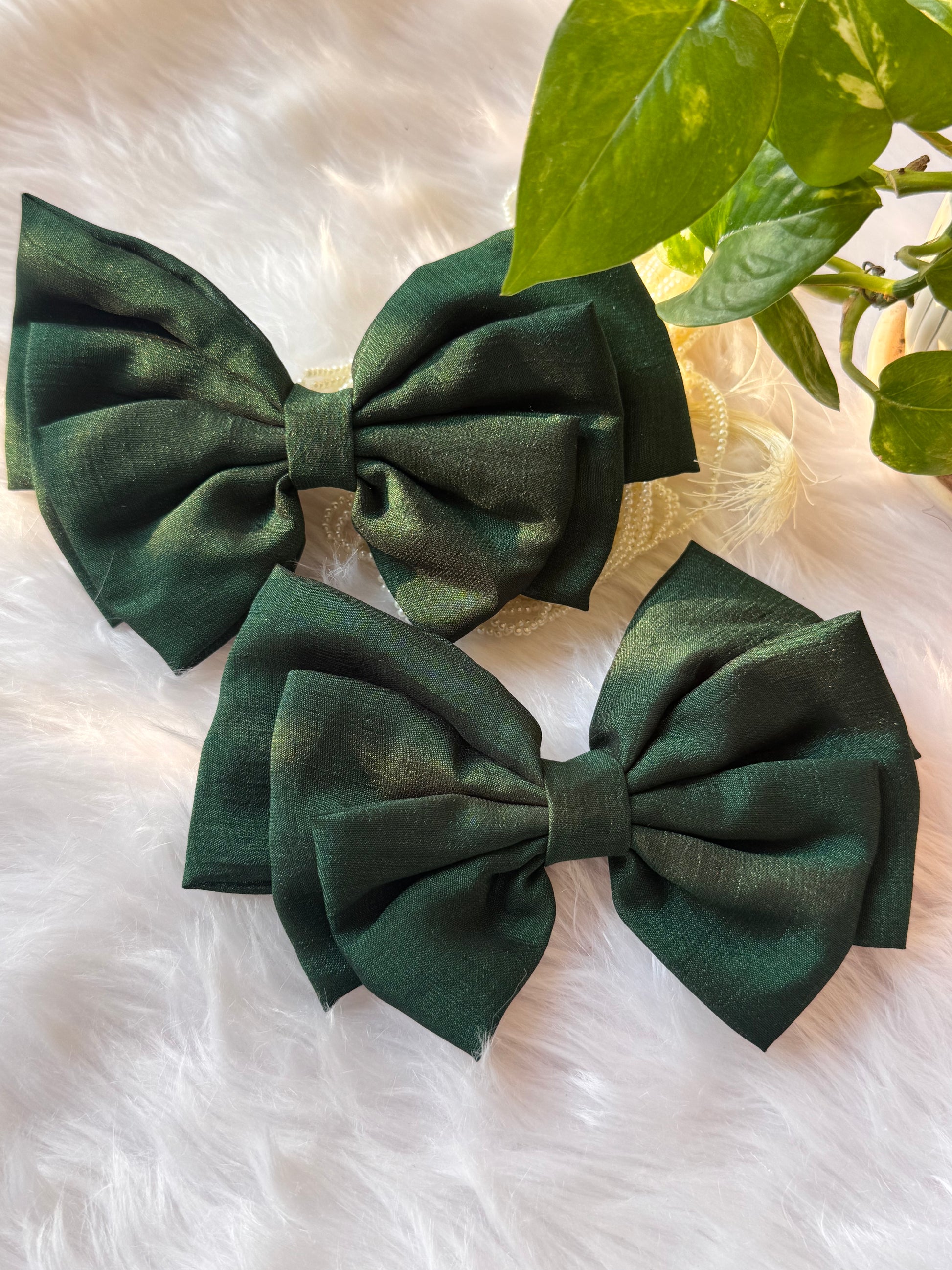 Set of two Forrest Green Vichitra Silk Hair Bows – premium bottle green accessories displayed front-facing in a straight alignment.