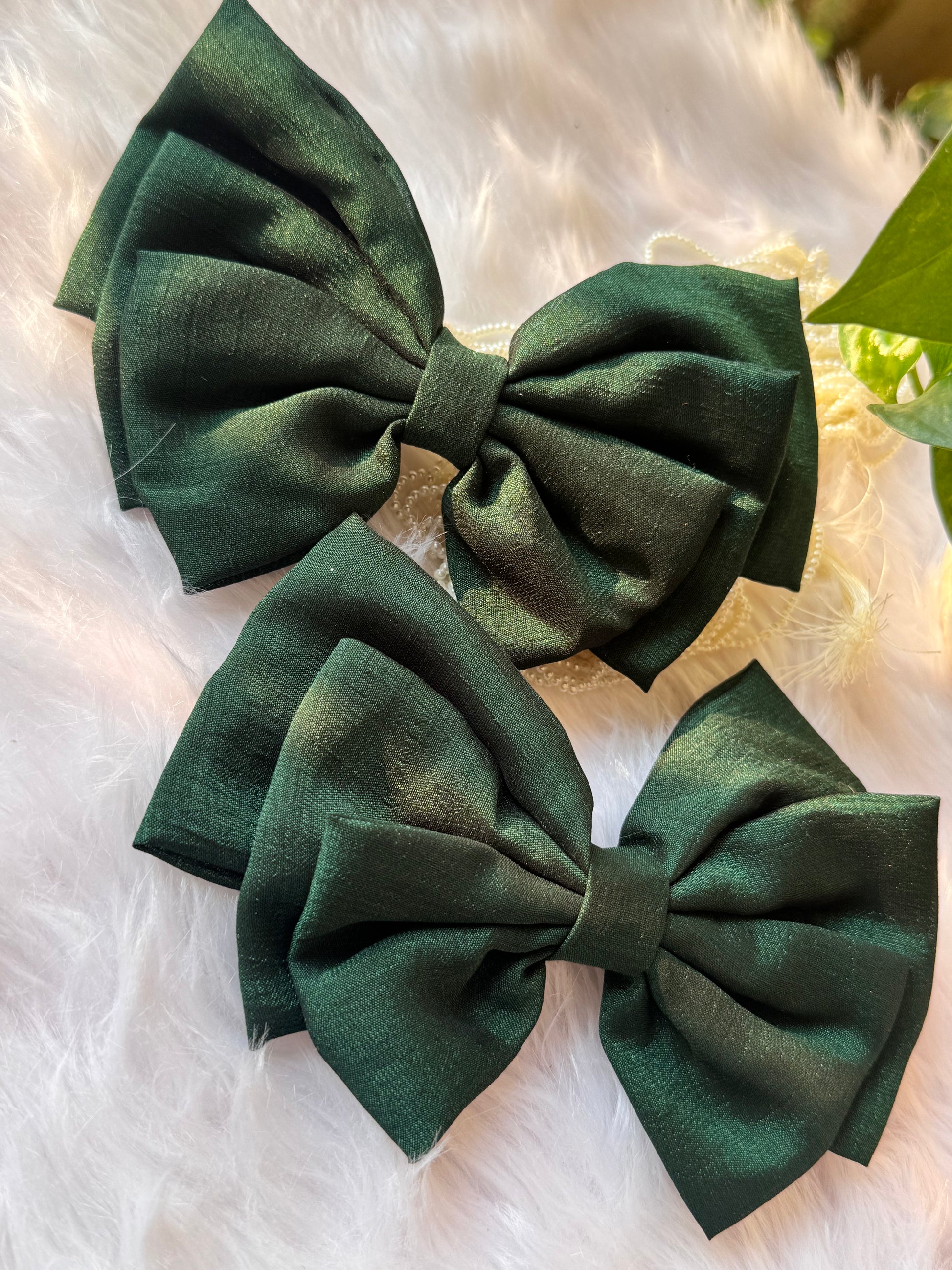 Collection of Forrest Green Vichitra Silk Hair Bows – elegant bottle green hair accessories neatly arranged front-facing.