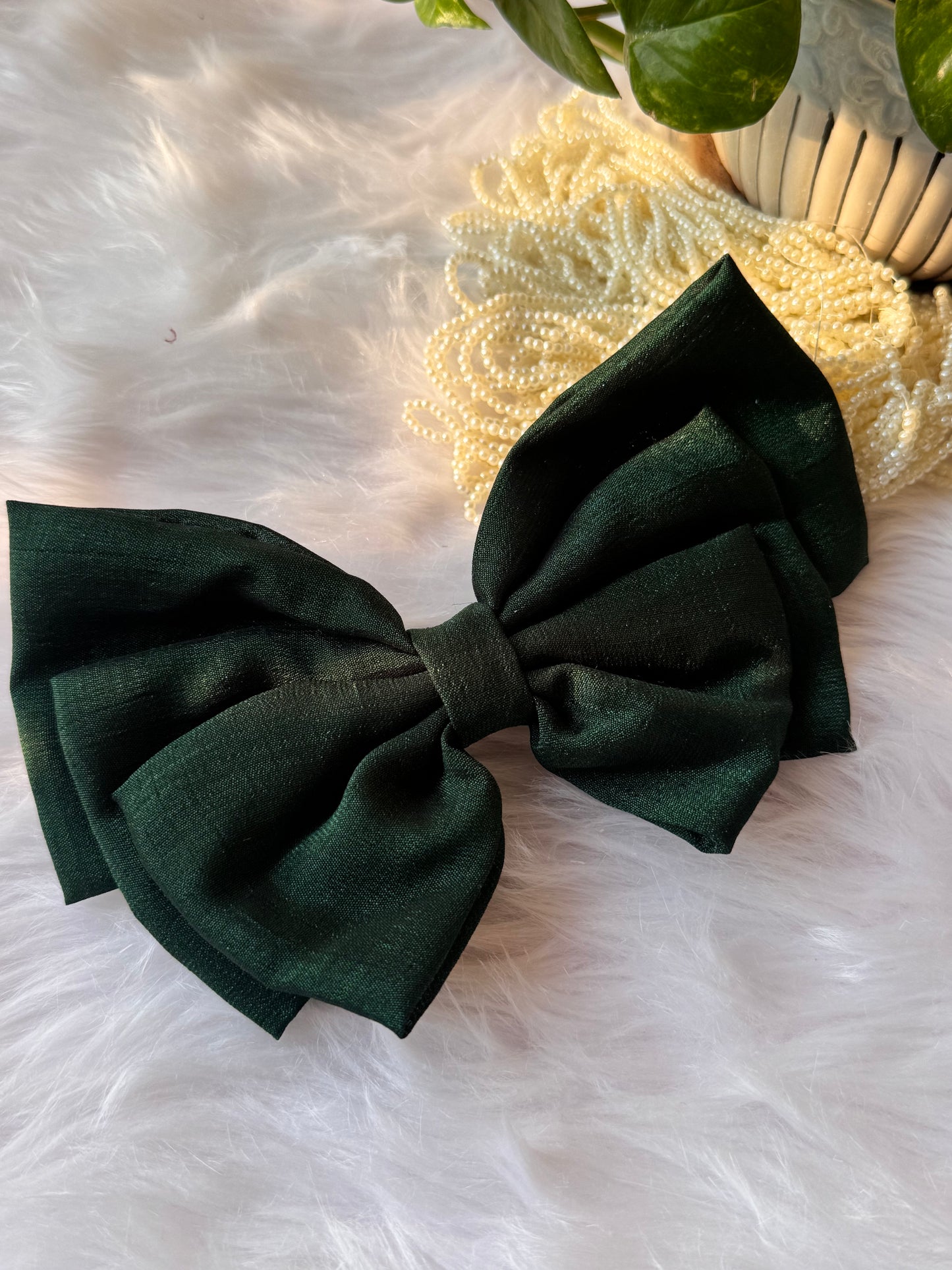 Forrest Green Vichitra Silk Hair Bow – luxurious bottle green hair accessory displayed front-facing in a straight position.