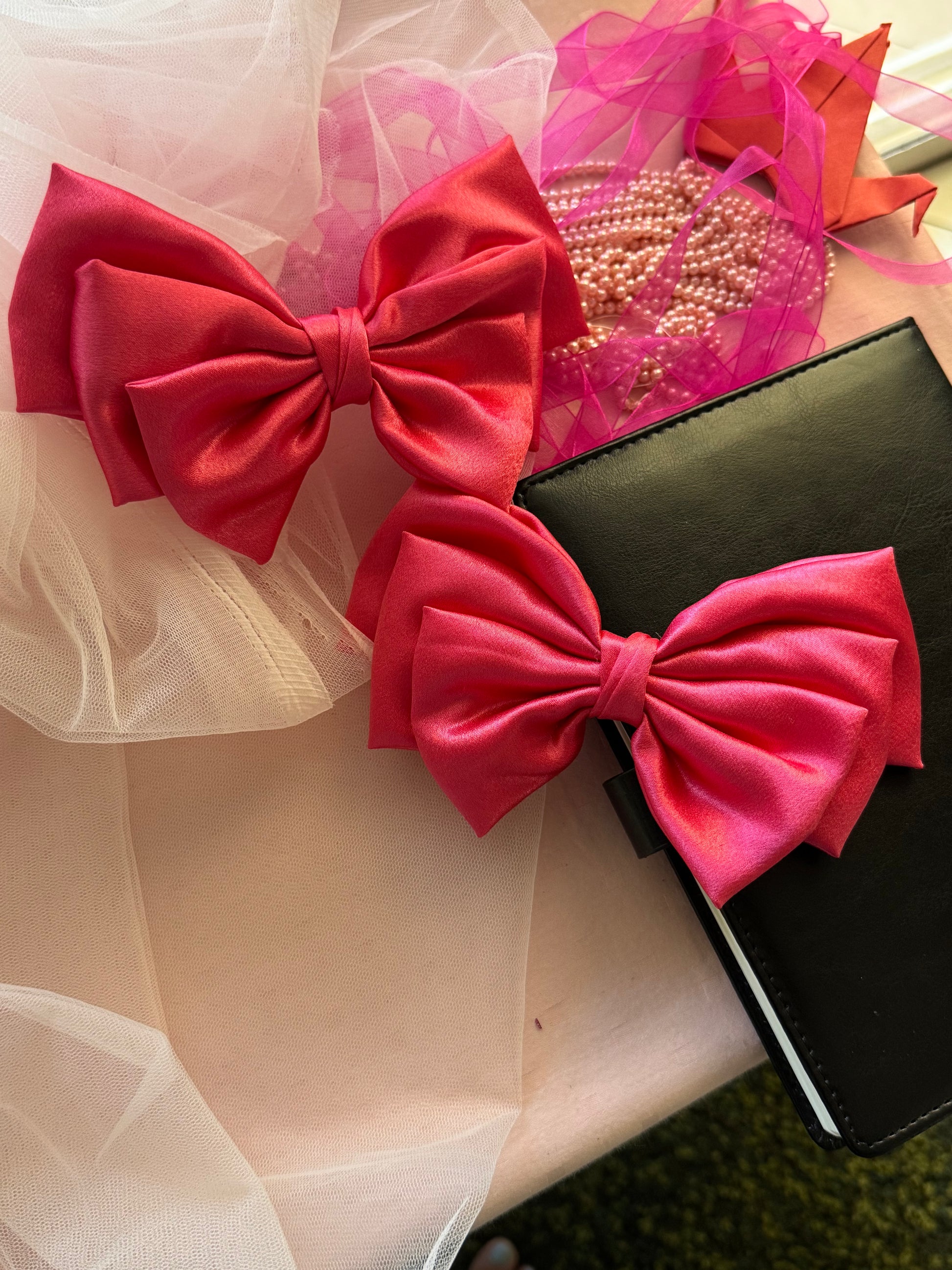 Two Satin Hair bows with Clip Front Size, beautiful glossy Pink Color with light and dark, with Props kept non parallely