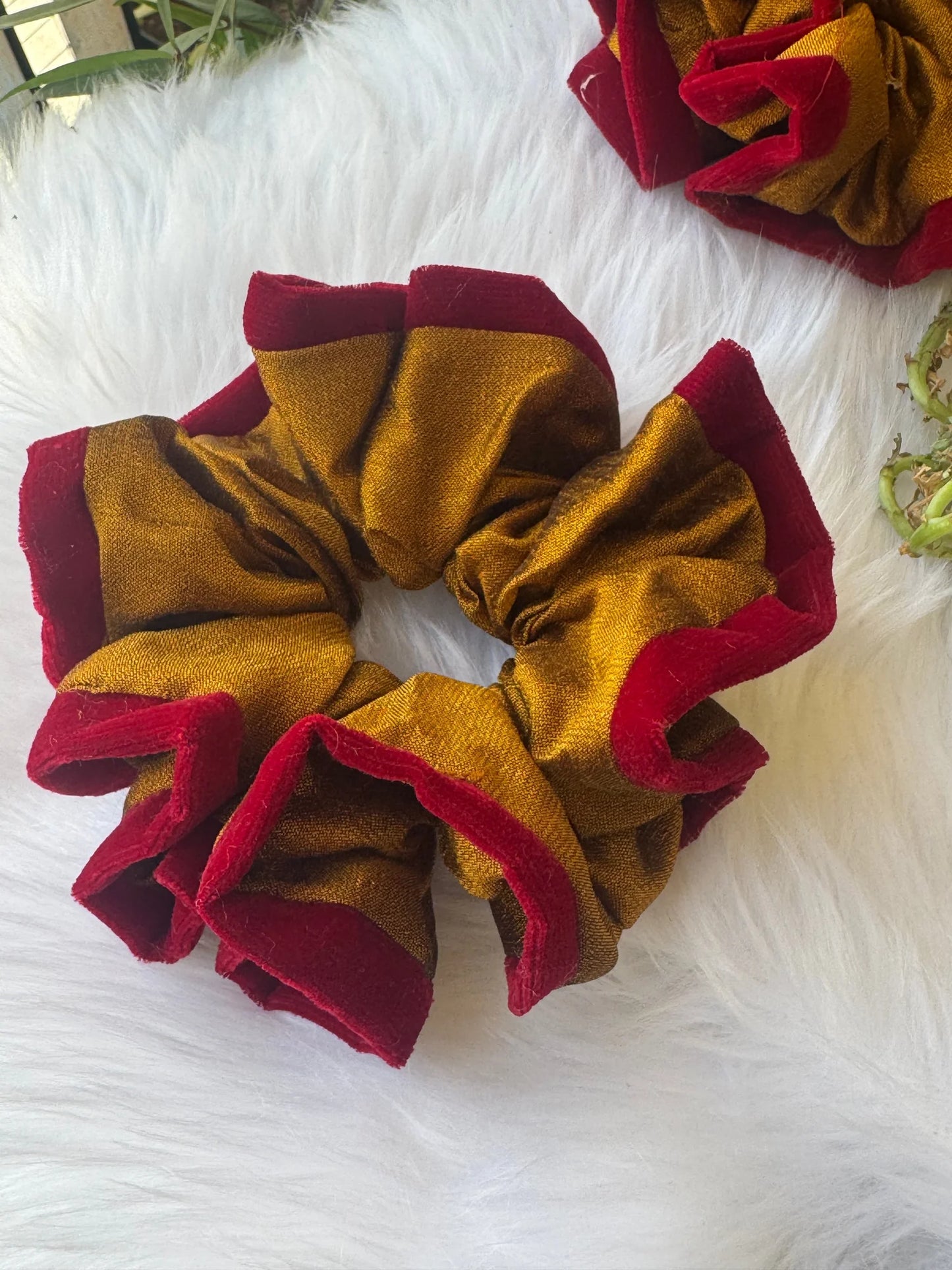 Golden yellow silk scrunchie with maroon velvet trim by Bows and Bags India, handmade hair accessory displayed on white