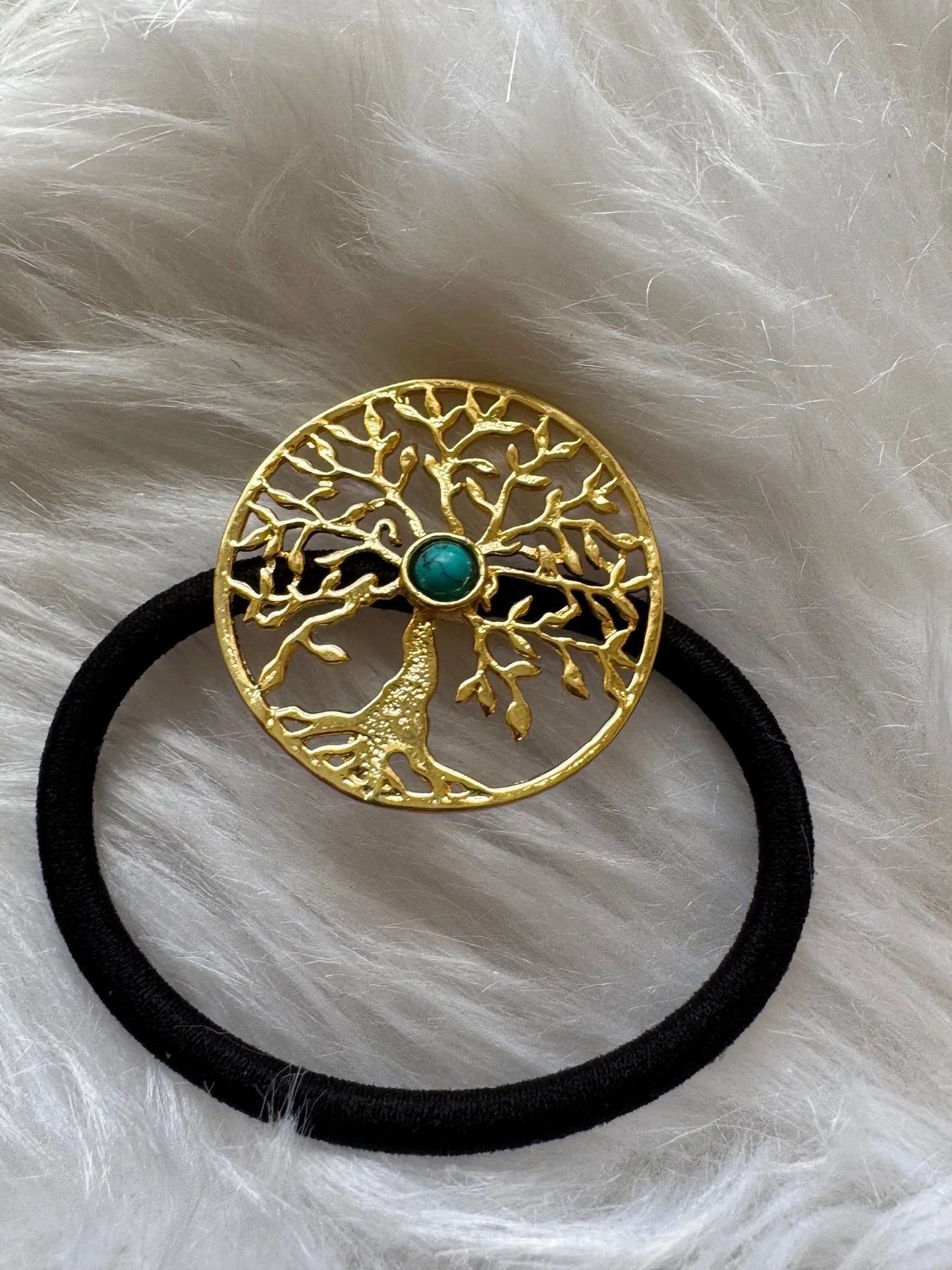 Golden Tree metal rubber band hair tie with turquoise stone accent by Bows and Bags India, displayed on black elastic band
