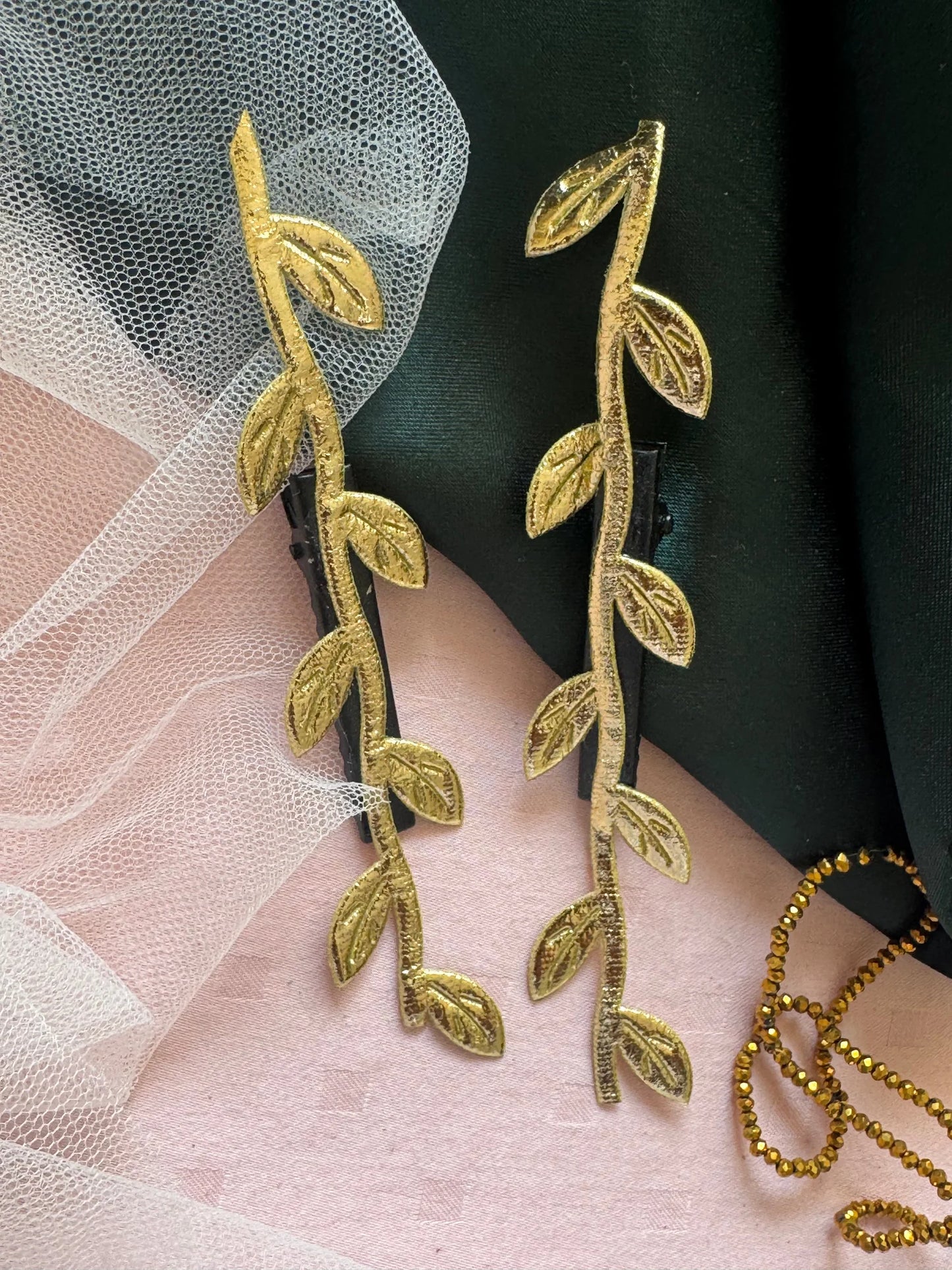 Golden Twig handmade hair clips with leaf details on blush and forest green fabric, Bows and Bags India