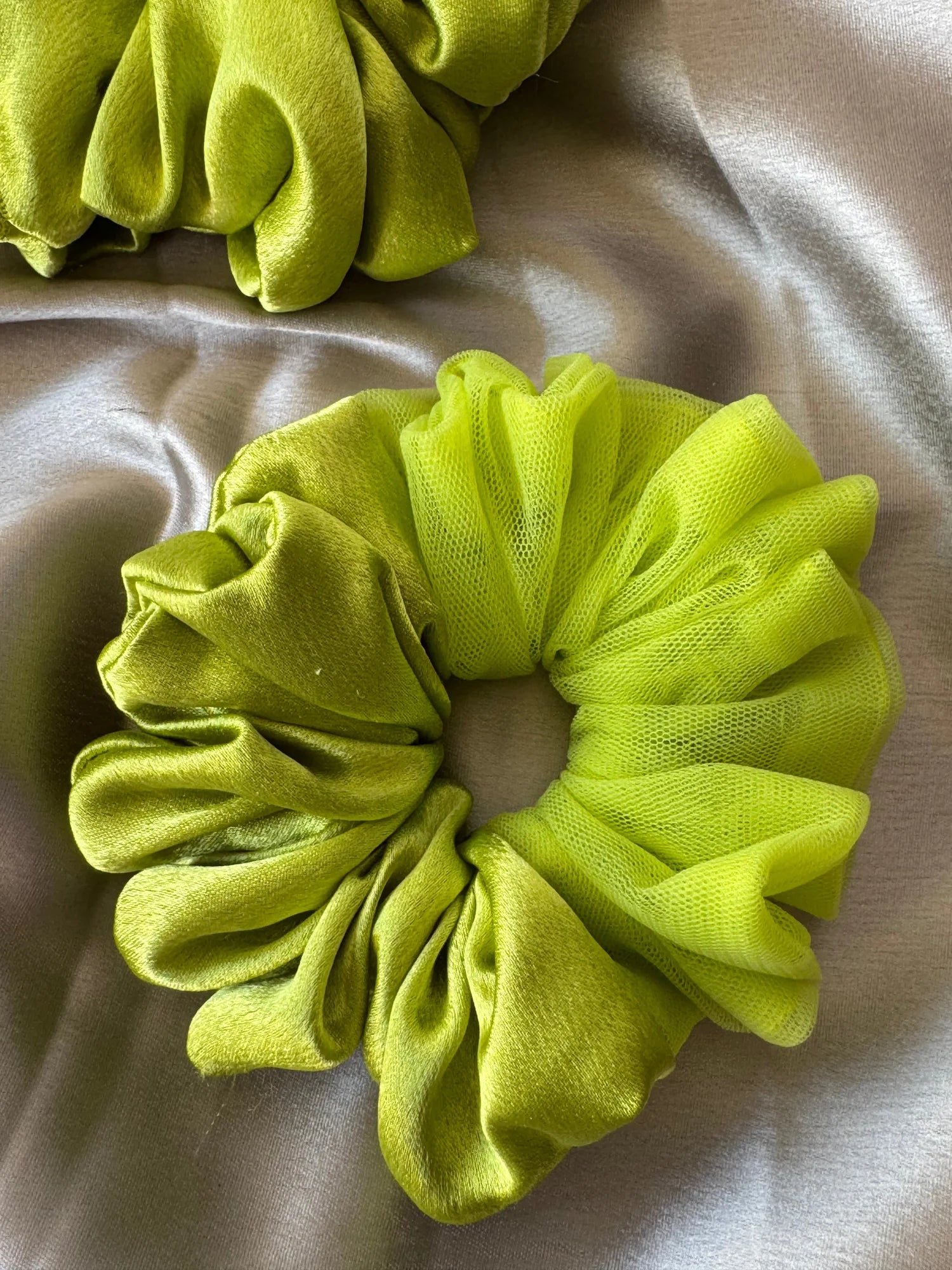 Neon green satin and net scrunchie with voluminous ruffled design by Bows and Bags India, handmade hair accessory on neutral