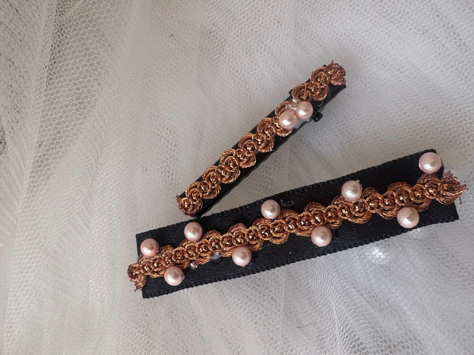 Pearl embroidered hair clip set by Bows and Bags India featuring golden filigree design and lustrous pearls on contrasting