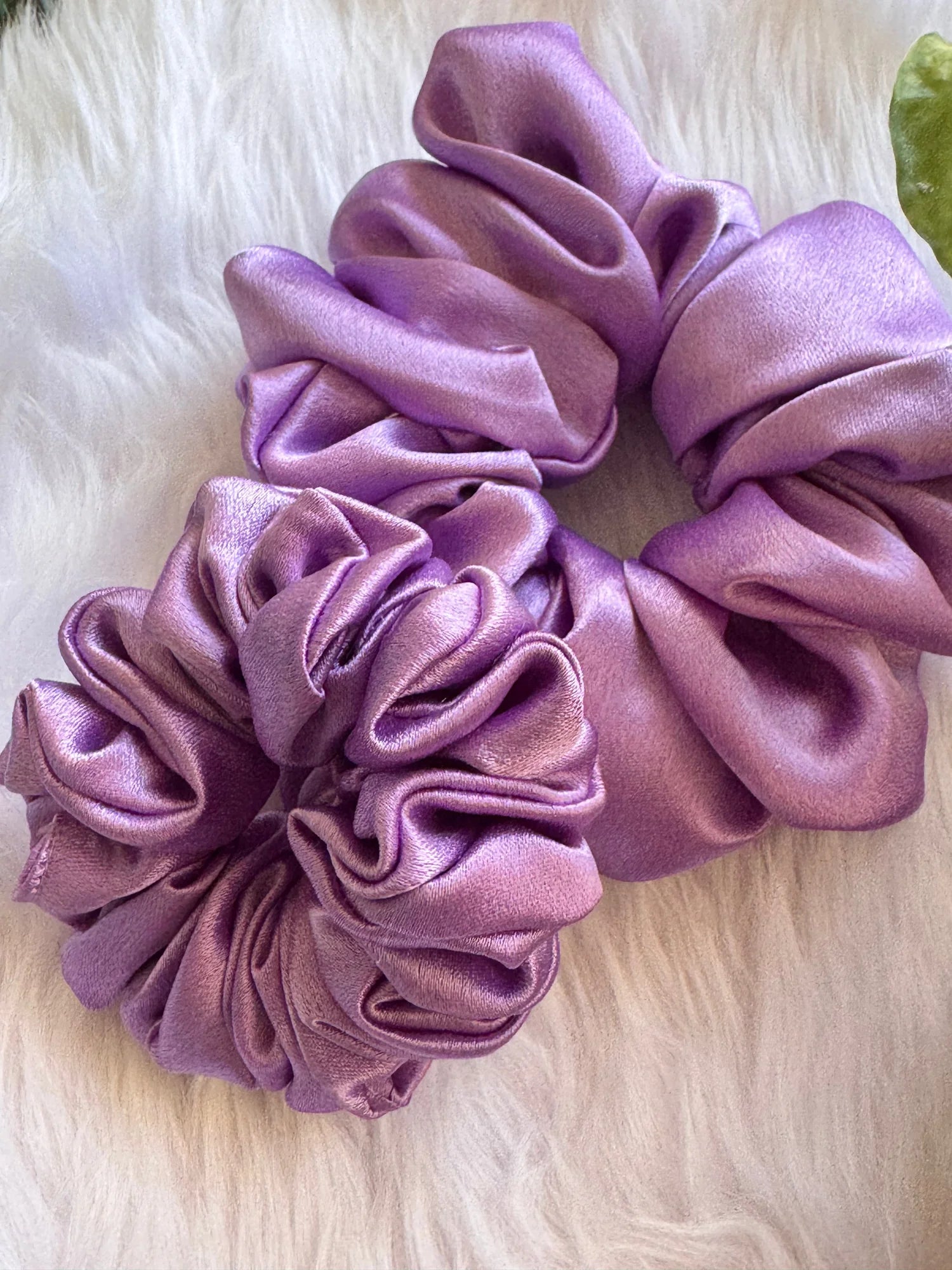 Lavender Duo satin scrunchies combo by Bows and Bags India showing soft fluffy texture and handmade detail on white fur