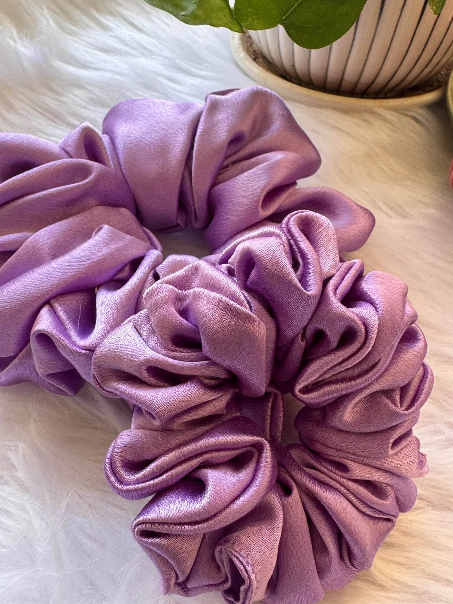 Lavender Duo satin scrunchies combo displayed on white fur, showing soft fluffy texture and dreamy lavender shade by Bows