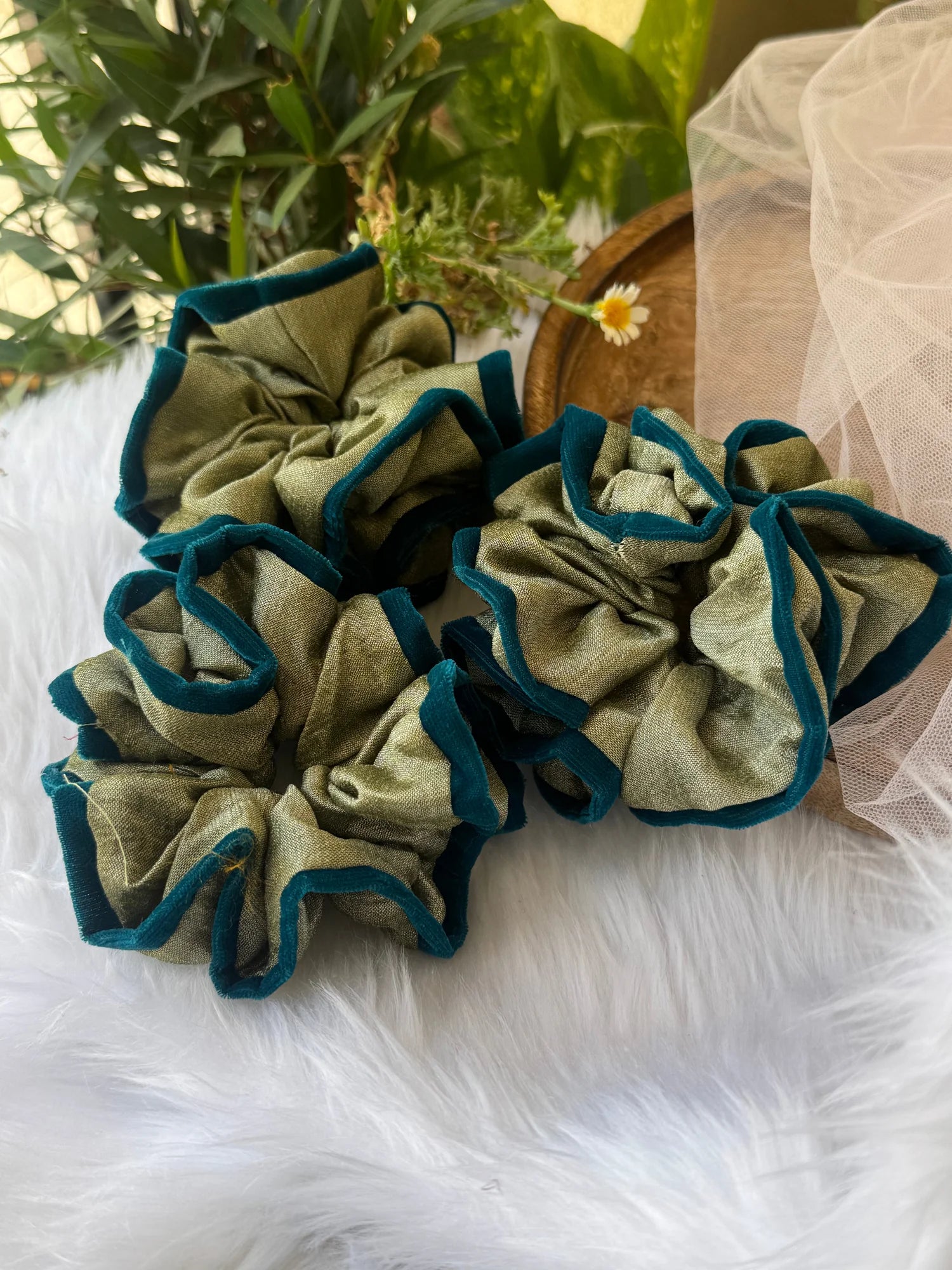 Mint green silk velvet scrunchies with dark teal trim by Bows and Bags India, handmade hair accessories displayed on white
