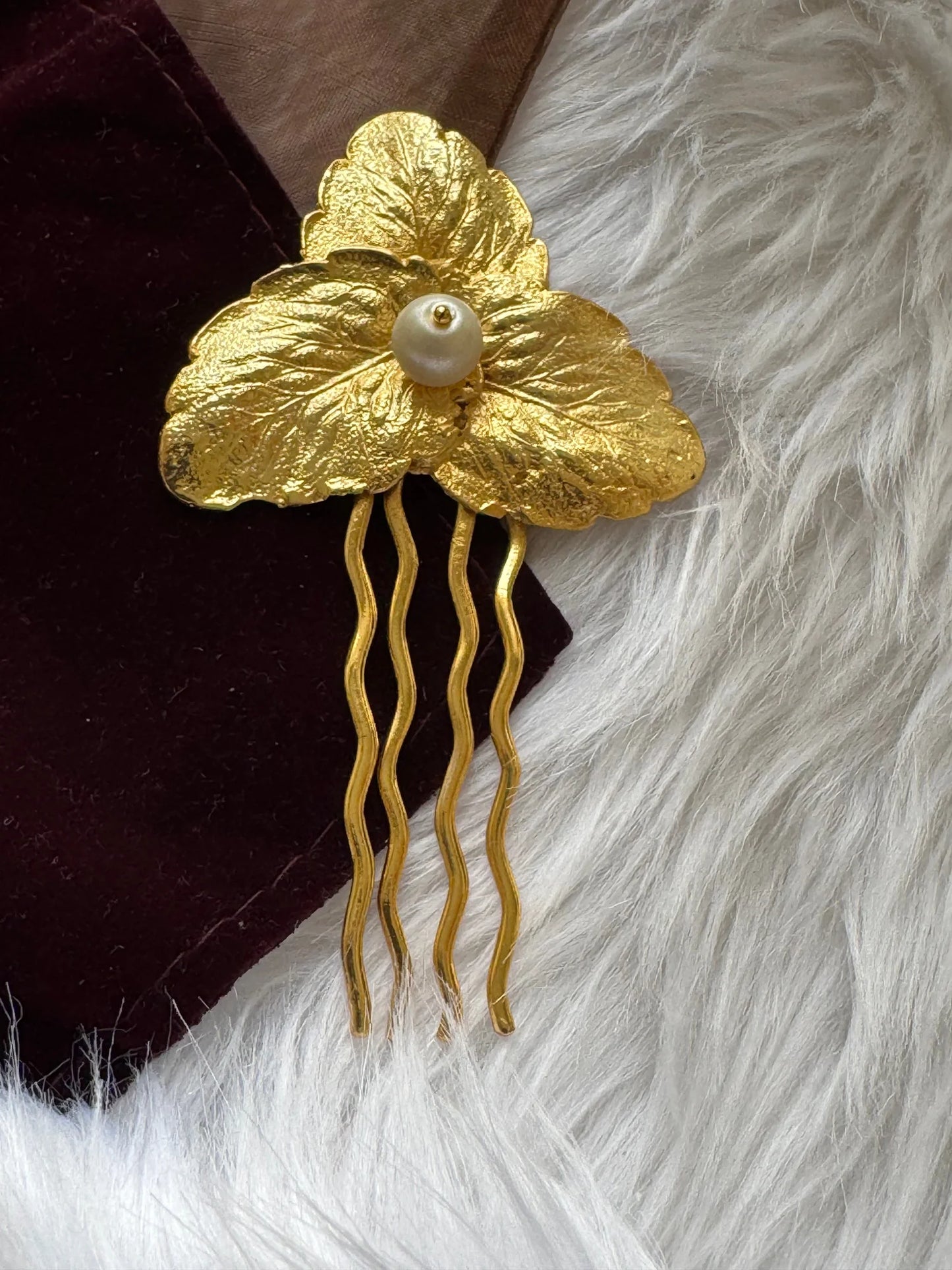 Pearl Golden Leaf hair pin with textured gold leaves and lustrous pearl center by Bows and Bags India, handmade accessory on