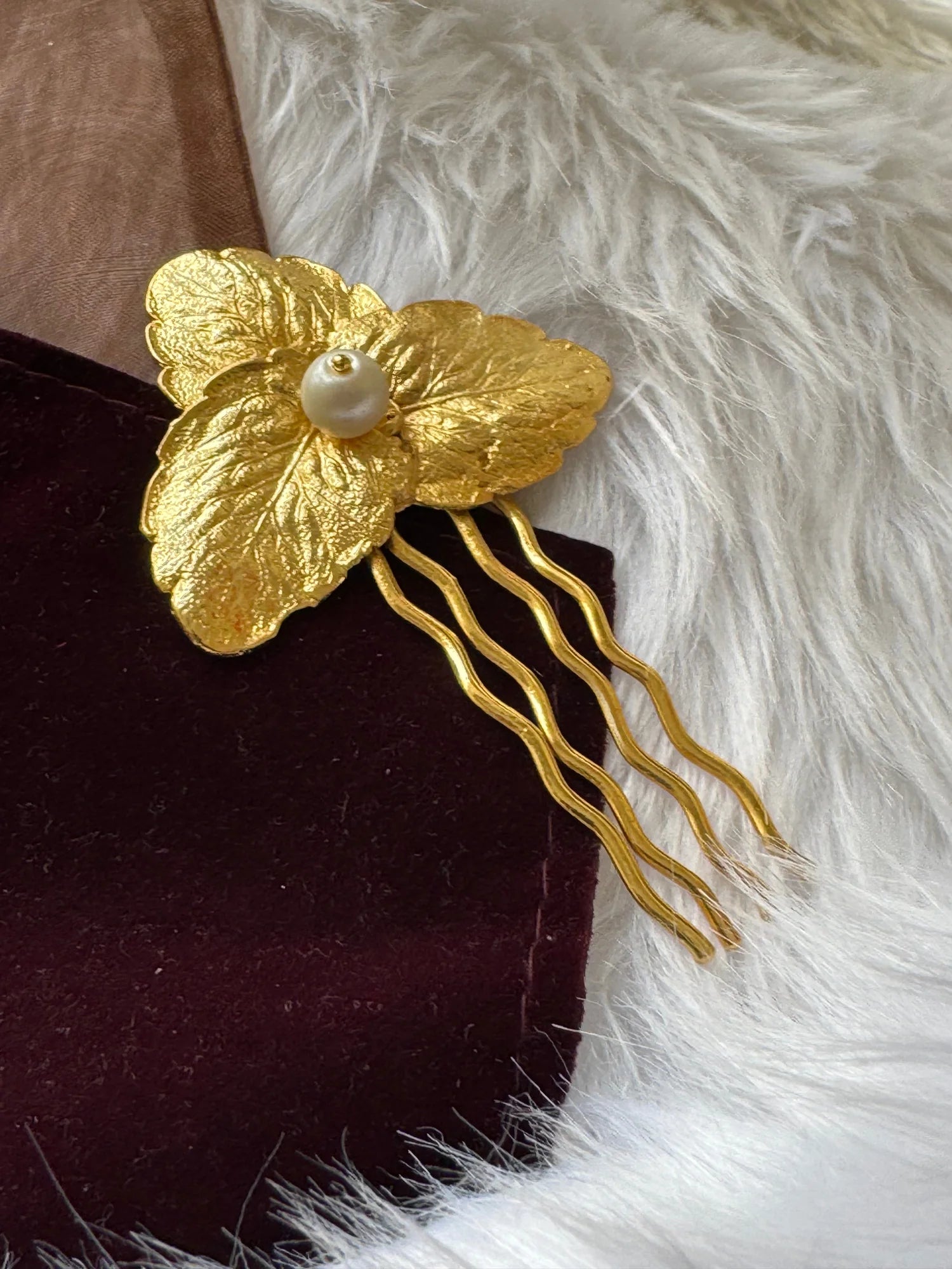 Pearl Golden Leaf hair pin with textured gold leaves and lustrous pearl center by Bows and Bags India, handmade accessory on