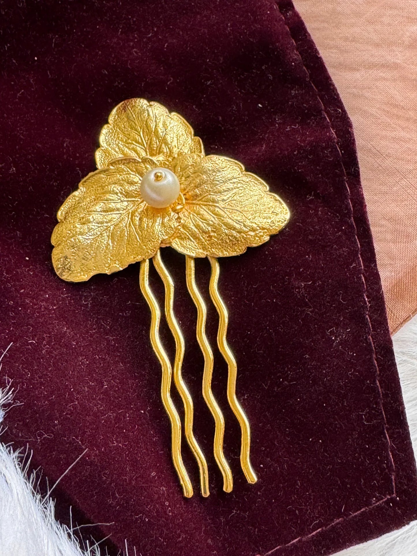 Pearl Golden Leaf hair pin on burgundy velvet, textured gold leaves with lustrous pearl center, Bows and Bags India handmade
