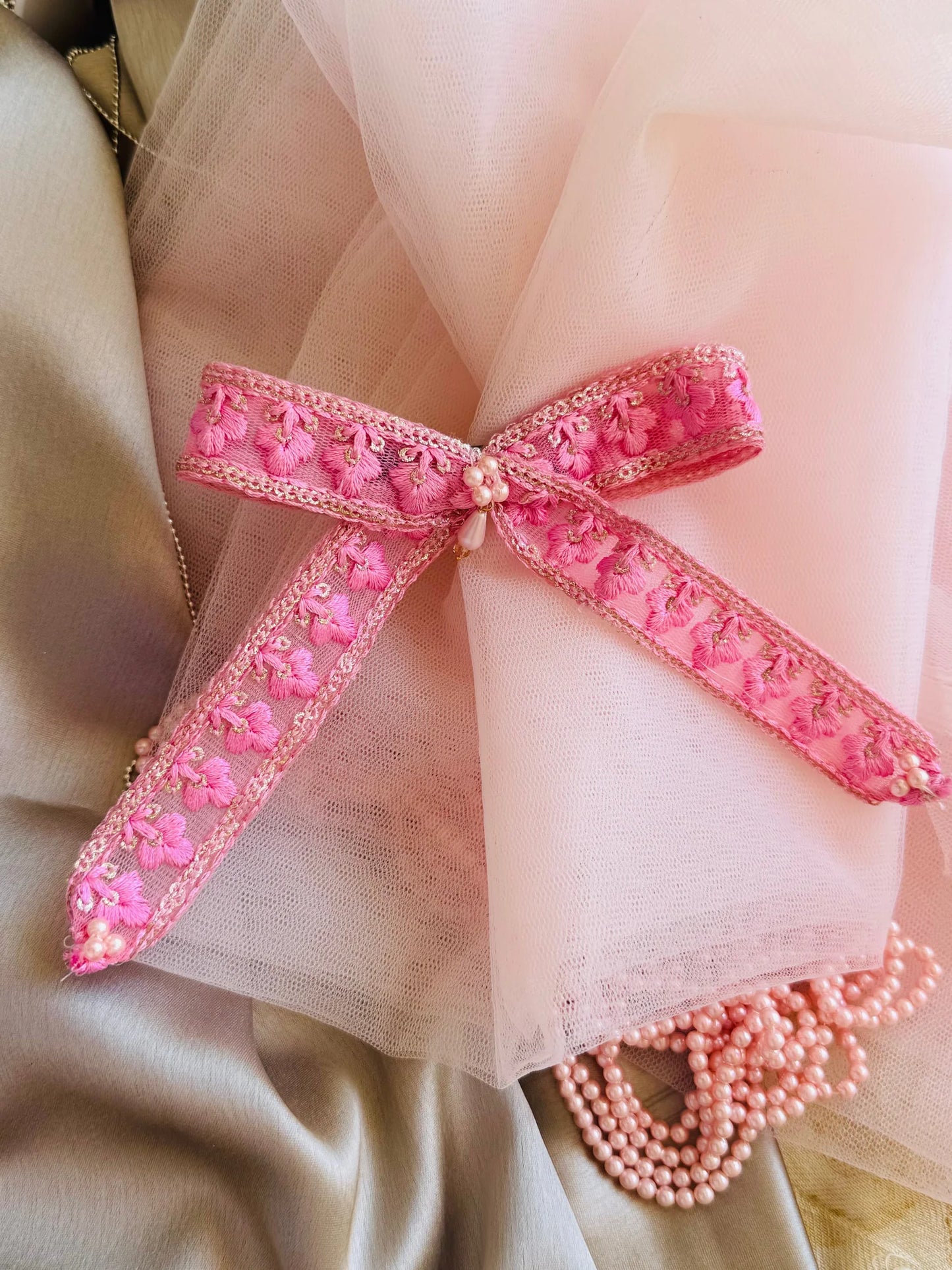 Pink Pearl Flower hair clip pair with embroidered floral design and pearl accents on tulle, handmade by Bows and Bags India