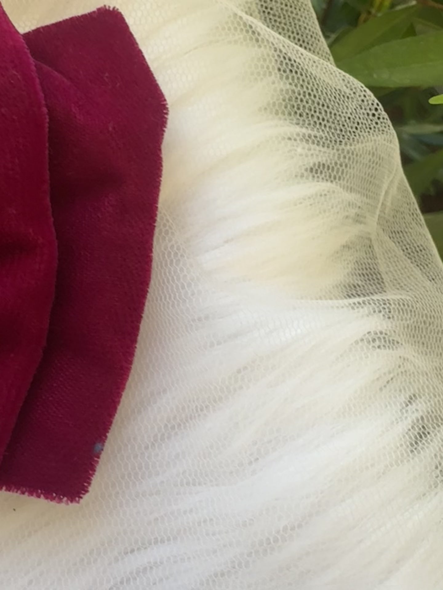 Close-up video of the Runaway Diva Hair Bow Clip, showcasing its rich magenta pink premium velvet fabric for a bold and luxurious design.