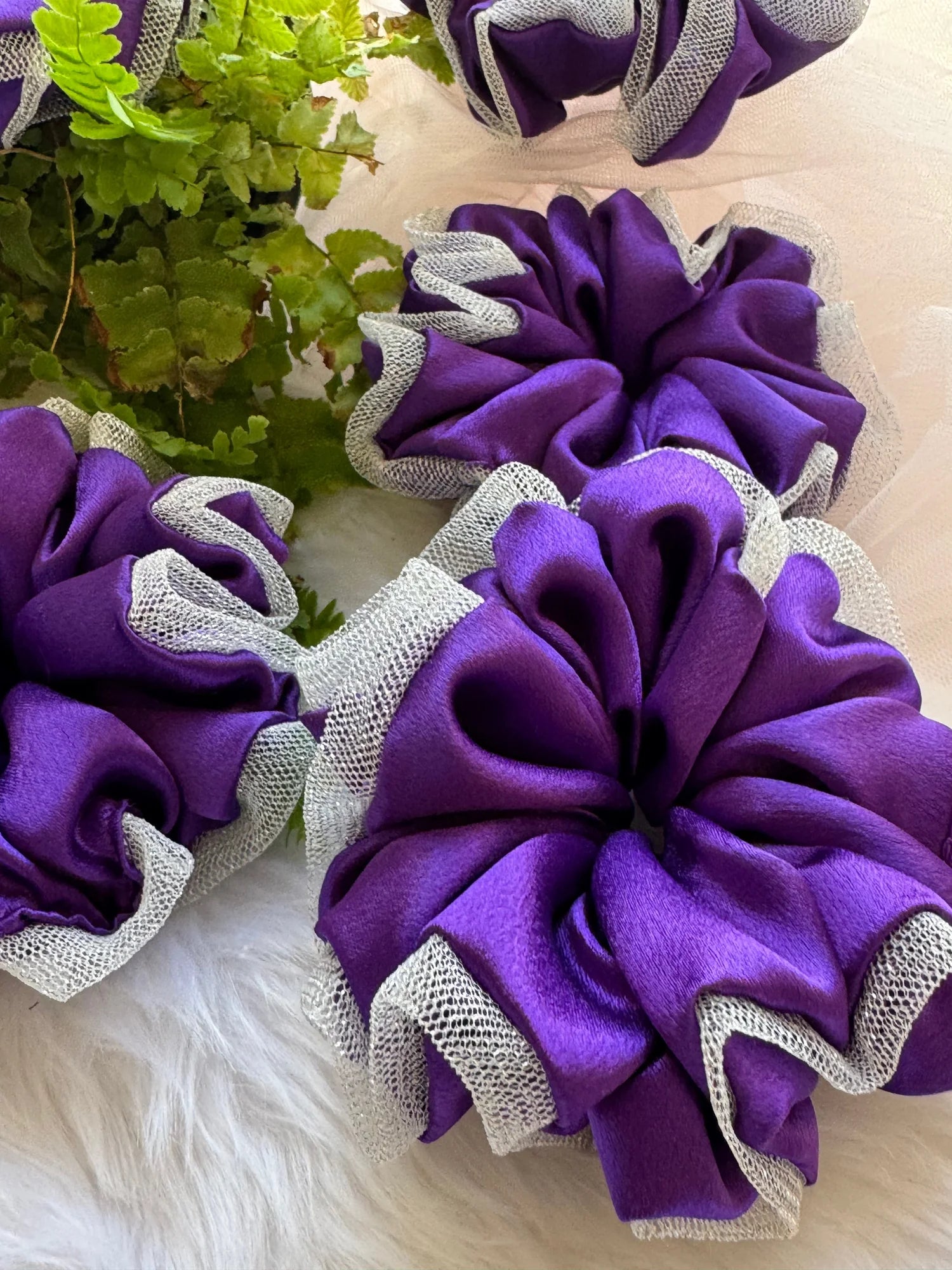 Purple satin and silver net scrunchies with green foliage detail by Bows and Bags India handmade hair accessories