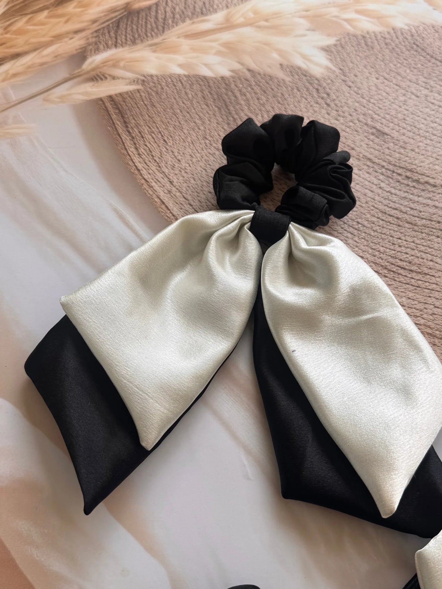 Black and white satin dual long tail scrunchie by Bows and Bags India, handmade bow hair accessory with elegant ribbon