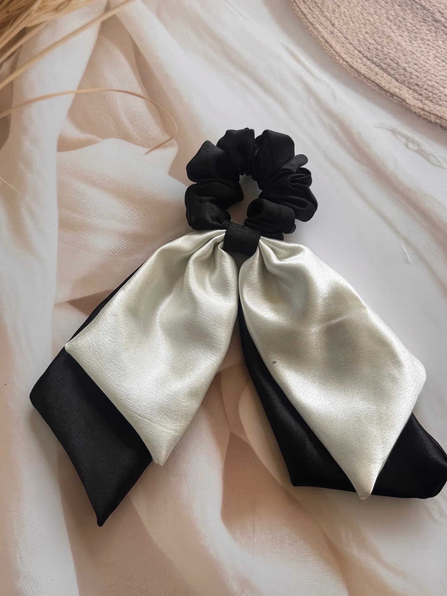 Black and white satin dual long tail scrunchie with elegant bow detail by Bows and Bags India, handmade hair accessory on