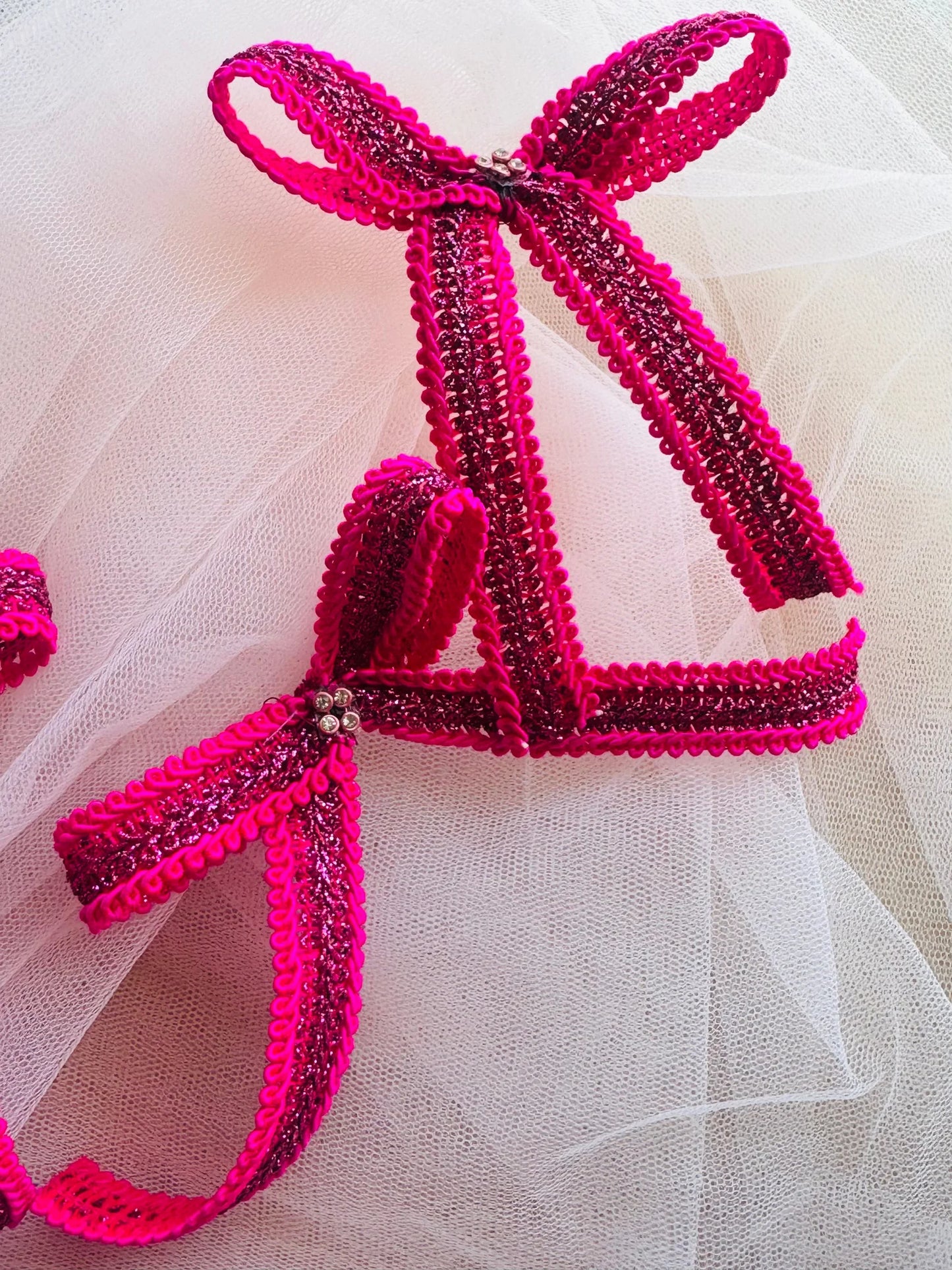 Rose Roosevelt handmade hair bow clip in vibrant pink with purple and gold beaded detailing by Bows and Bags India