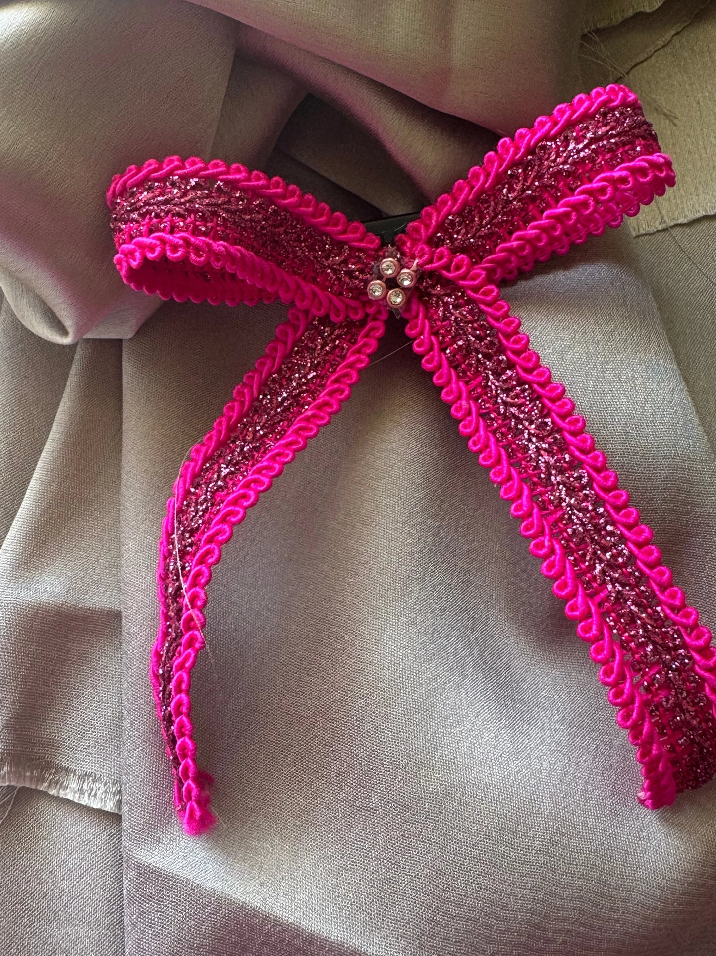 Rose Roosevelt handmade hair bow with neon pink sequins and gold glitter details by Bows and Bags India