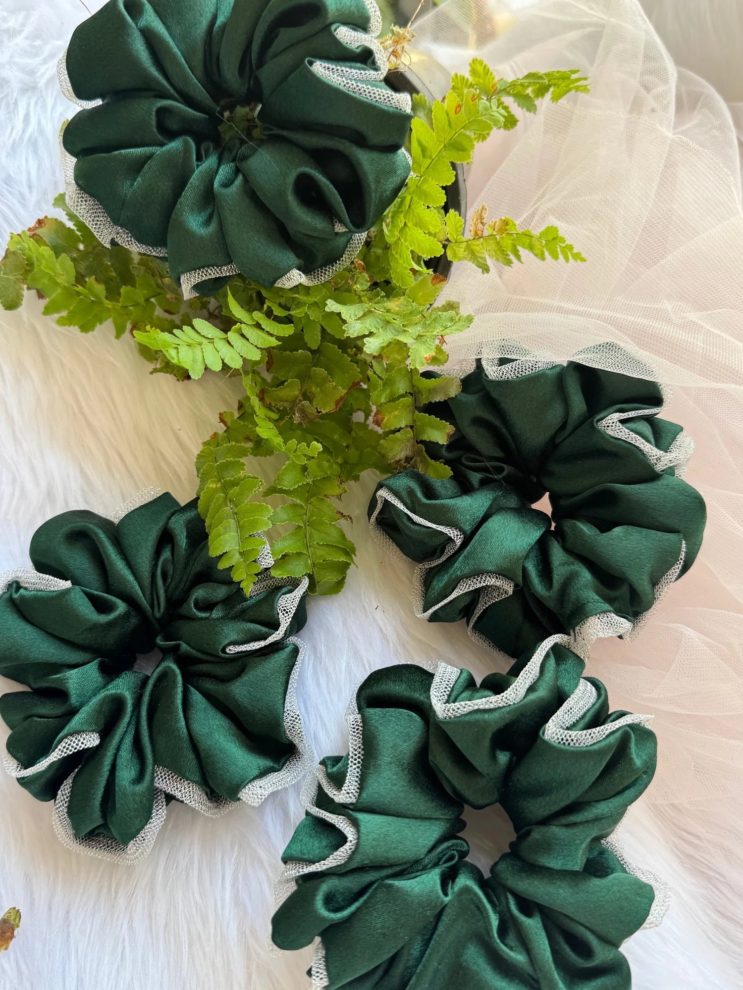 Dark green satin scrunchies with silver net trim and fern leaves, handmade hair accessories by Bows and Bags India