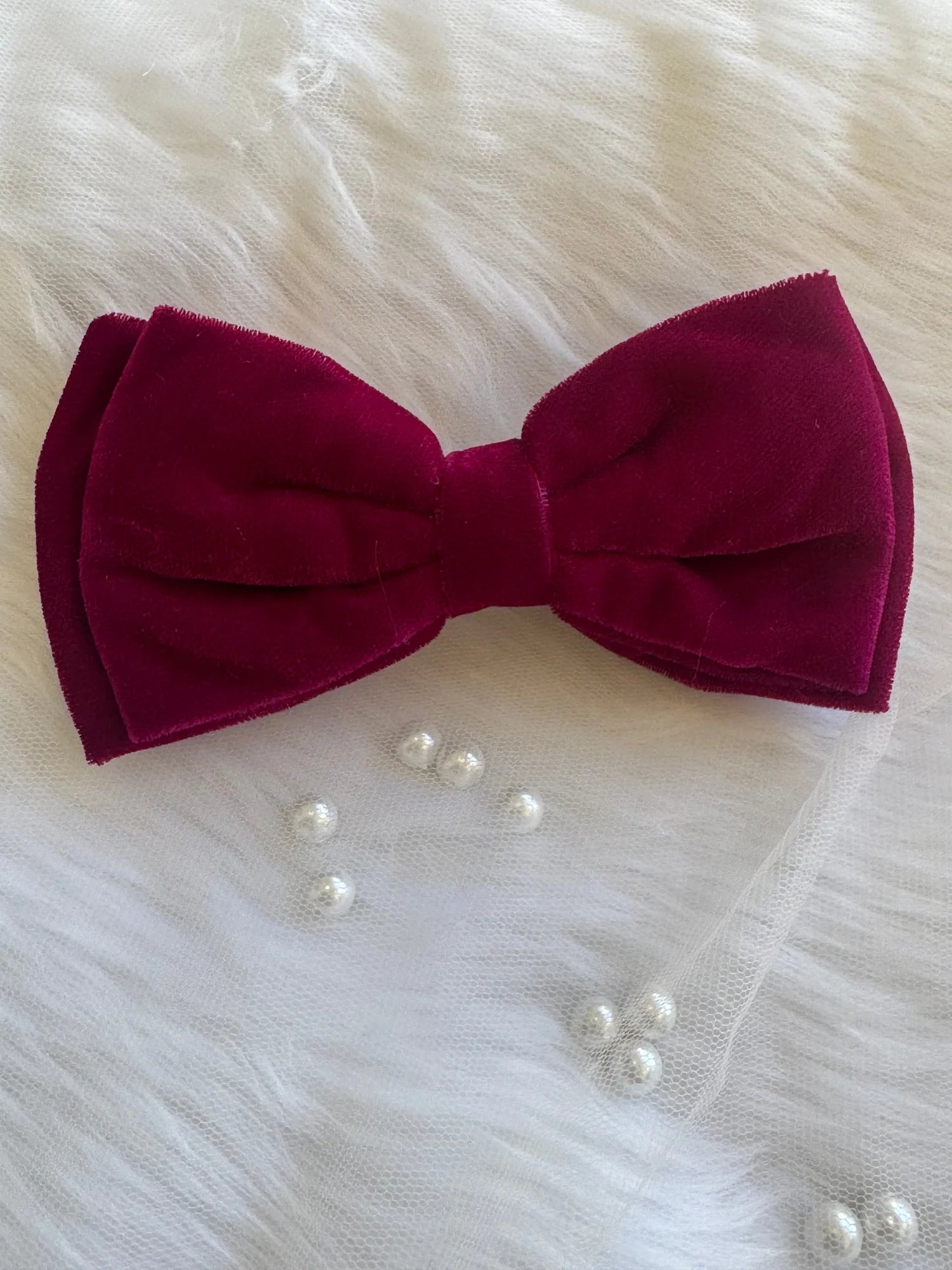 Magenta pink velvet hair bow with pearl beads styling detail by Bows and Bags India handmade accessories