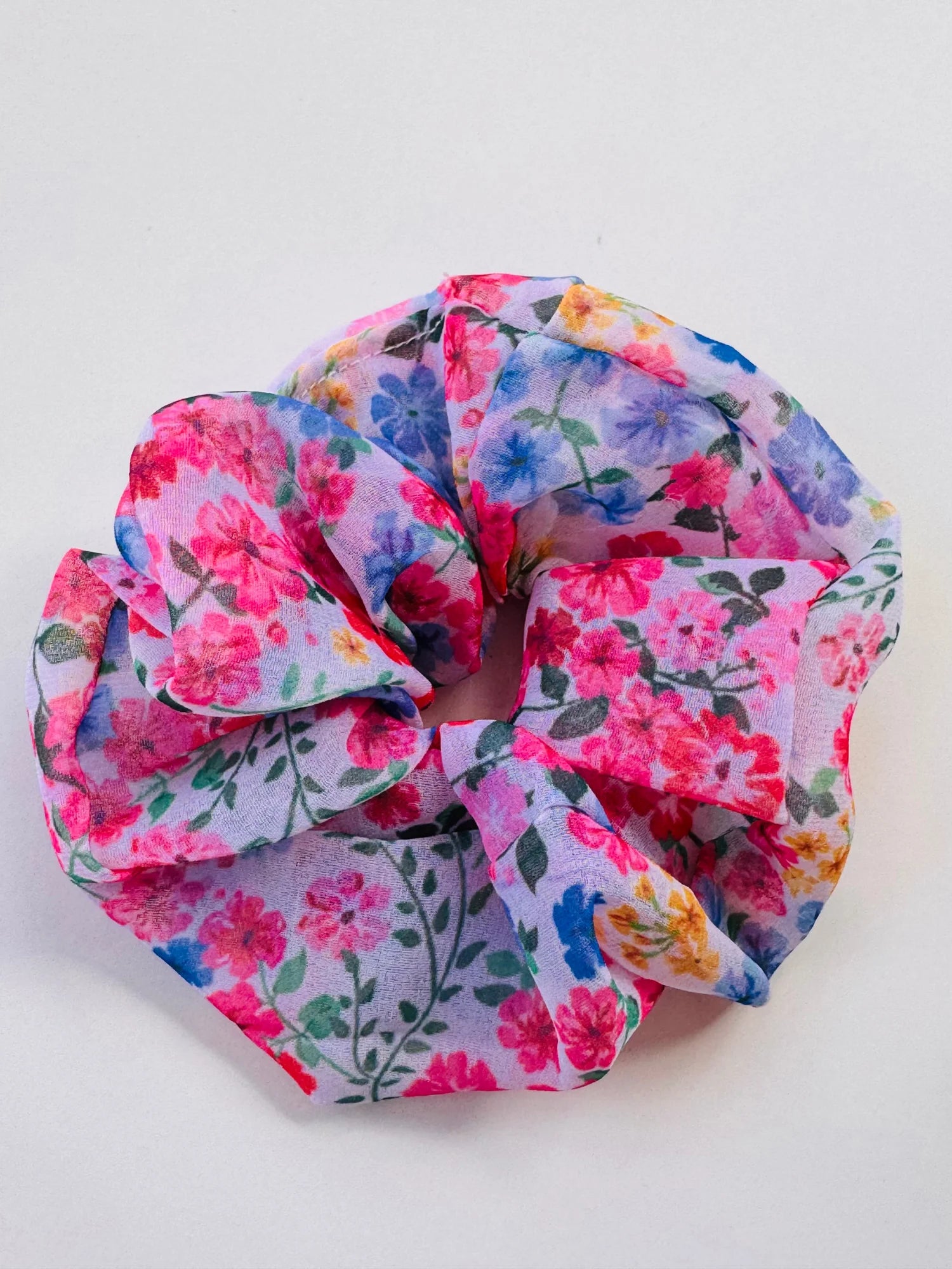 Floral georgette scrunchie pack showing vibrant pink, blue and yellow flower prints in large size by Bows and Bags India
