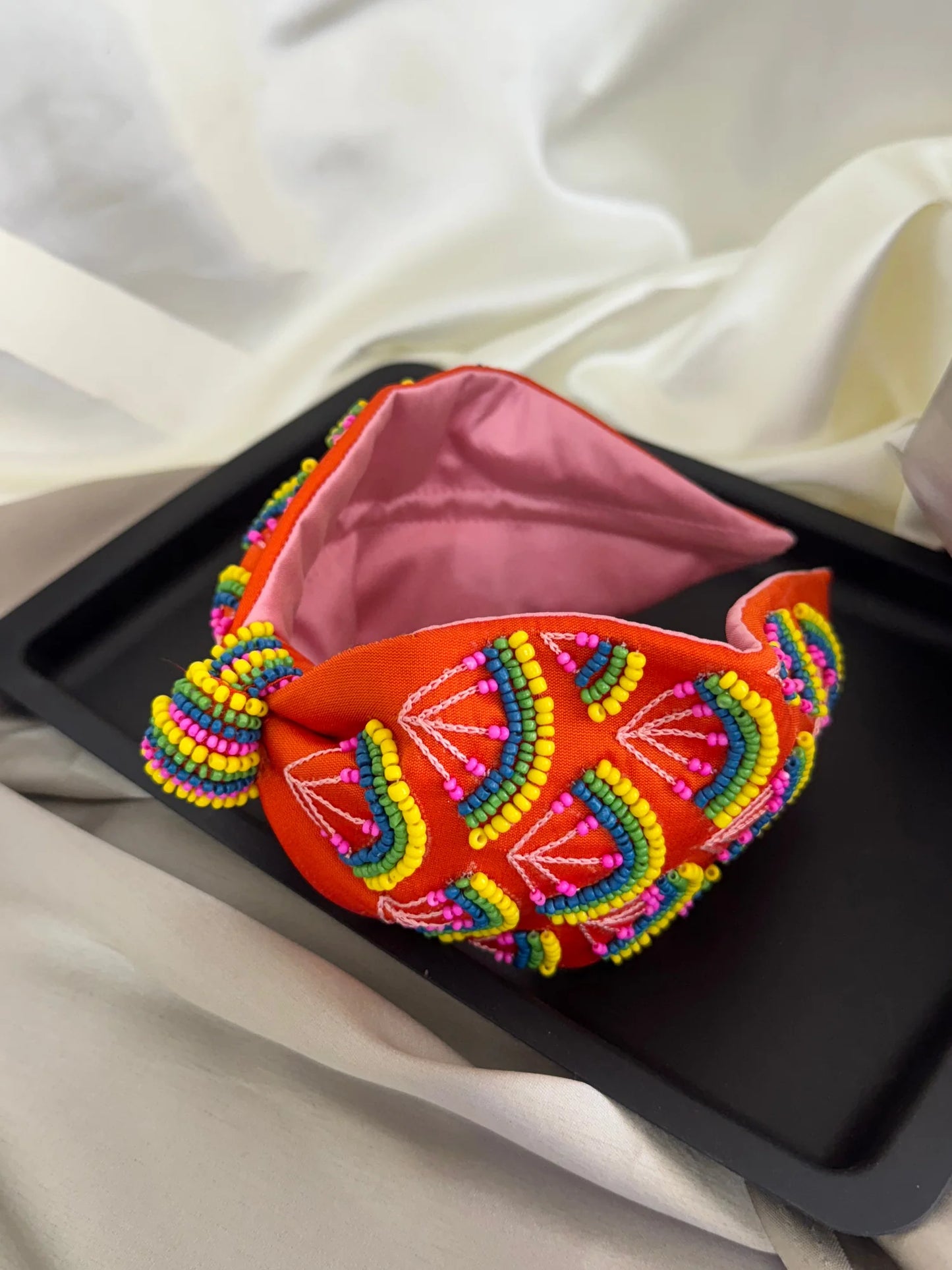 Tangerine Hawai handmade beaded satin headband with vibrant orange base and multicolored beadwork by Bows and Bags India